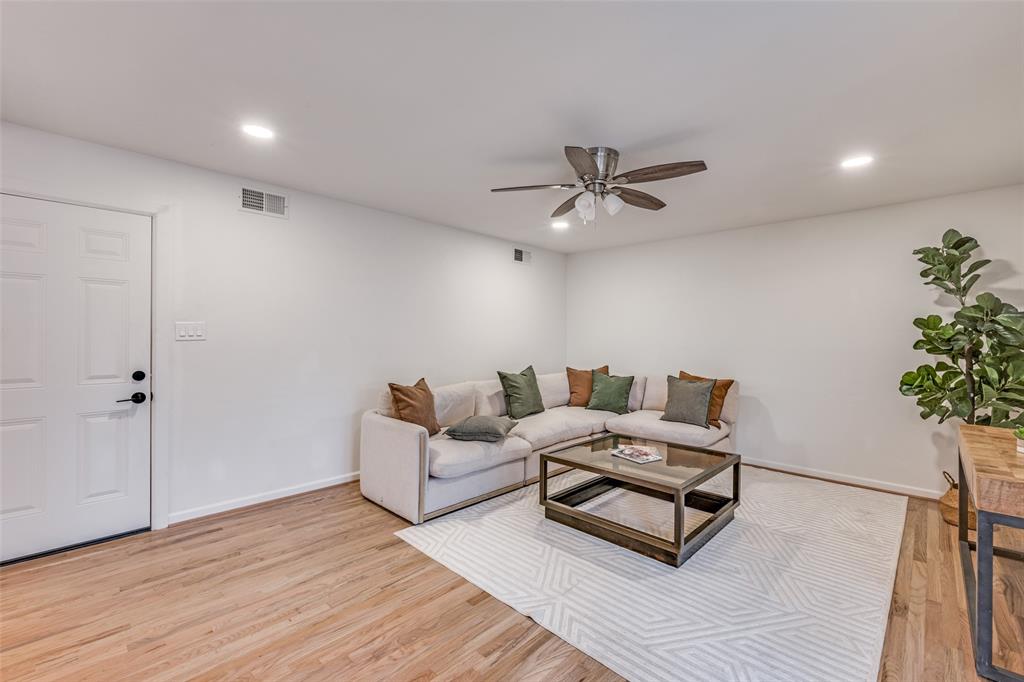 624 Forest Lane Hurst, TX 76053 - Photo 15 of 25 Living room with recessed lighting, ceiling fan, and light wood-type flooring