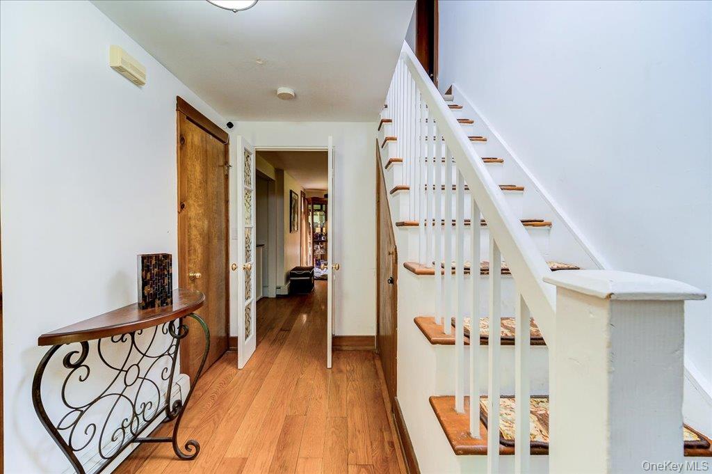 10-12 Woodlea Road Salt Point, NY 12578 - Photo 7 of 48 Hallway and steps leading to 2nd floor