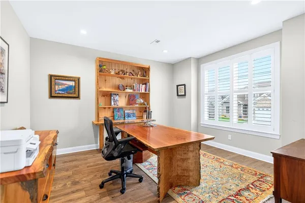 a workspace with furniture and a window