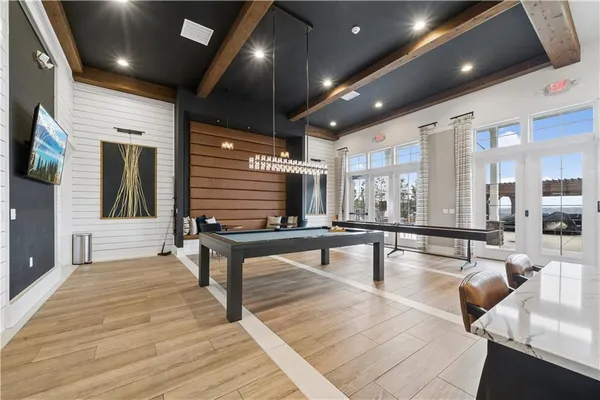 a lobby with furniture and windows