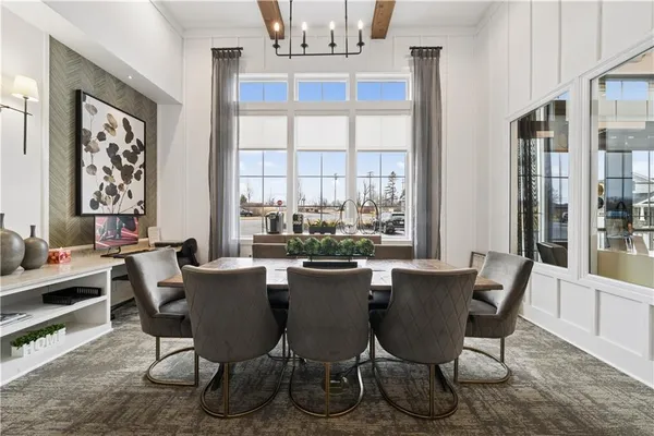 a view of a dining room with furniture window and outside view
