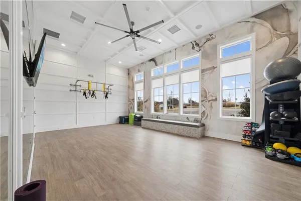a view of livingroom with furniture and a ceiling fan