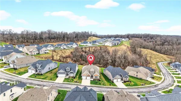 a view of a swimming pool with a lounge chair