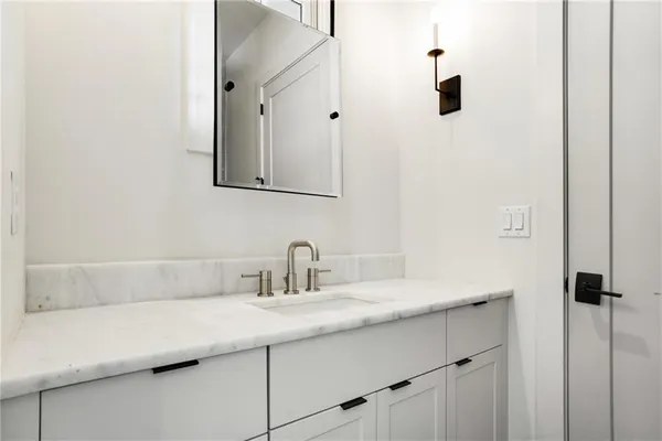 a bathroom with a sink and a bathtub