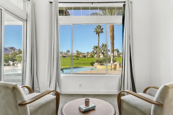 view of living room with furniture and garden