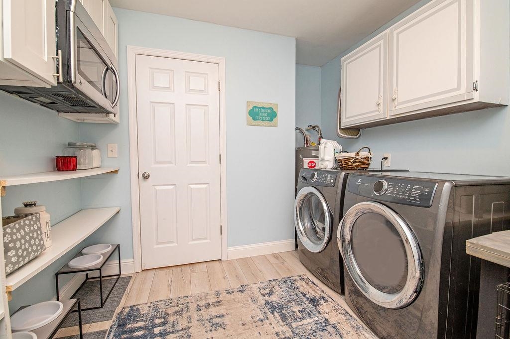 436 Orchis Road St. Augustine, FL 32086 - Photo 23 of 39 a utility room with sink dryer and washer