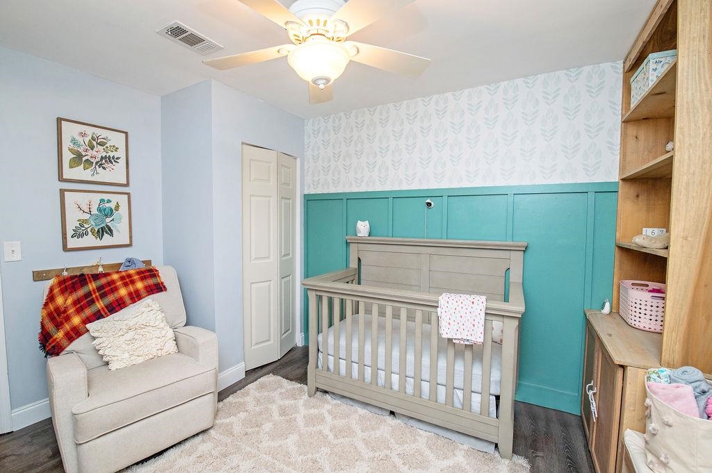 436 Orchis Road St. Augustine, FL 32086 - Photo 24 of 39 a bedroom with furniture and a baby crib