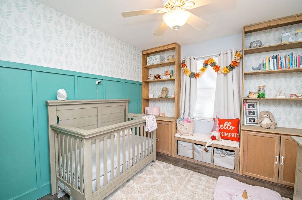 436 Orchis Road St. Augustine, FL 32086 - Photo 25 of 39 a bedroom with furniture and a baby crib