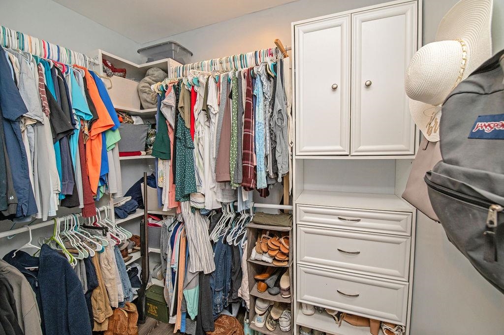 436 Orchis Road St. Augustine, FL 32086 - Photo 30 of 39 a view of walk in closet with clothes
