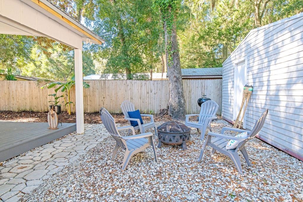 436 Orchis Road St. Augustine, FL 32086 - Photo 7 of 39 a view of a backyard with furniture and garden