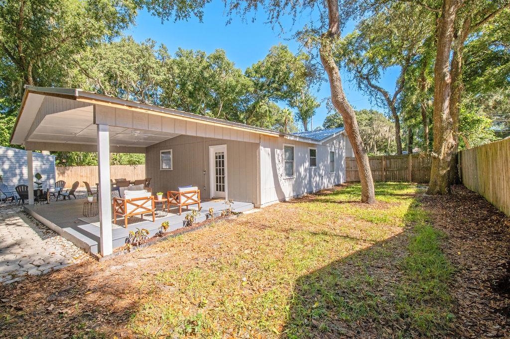 436 Orchis Road St. Augustine, FL 32086 - Photo 10 of 39 a view of a house with backyard and sitting area