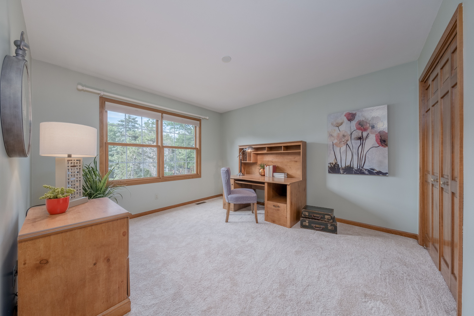 2410 Highland Road Geneva, IL 60134 - Photo 21 of 26 an empty room with furniture and a window