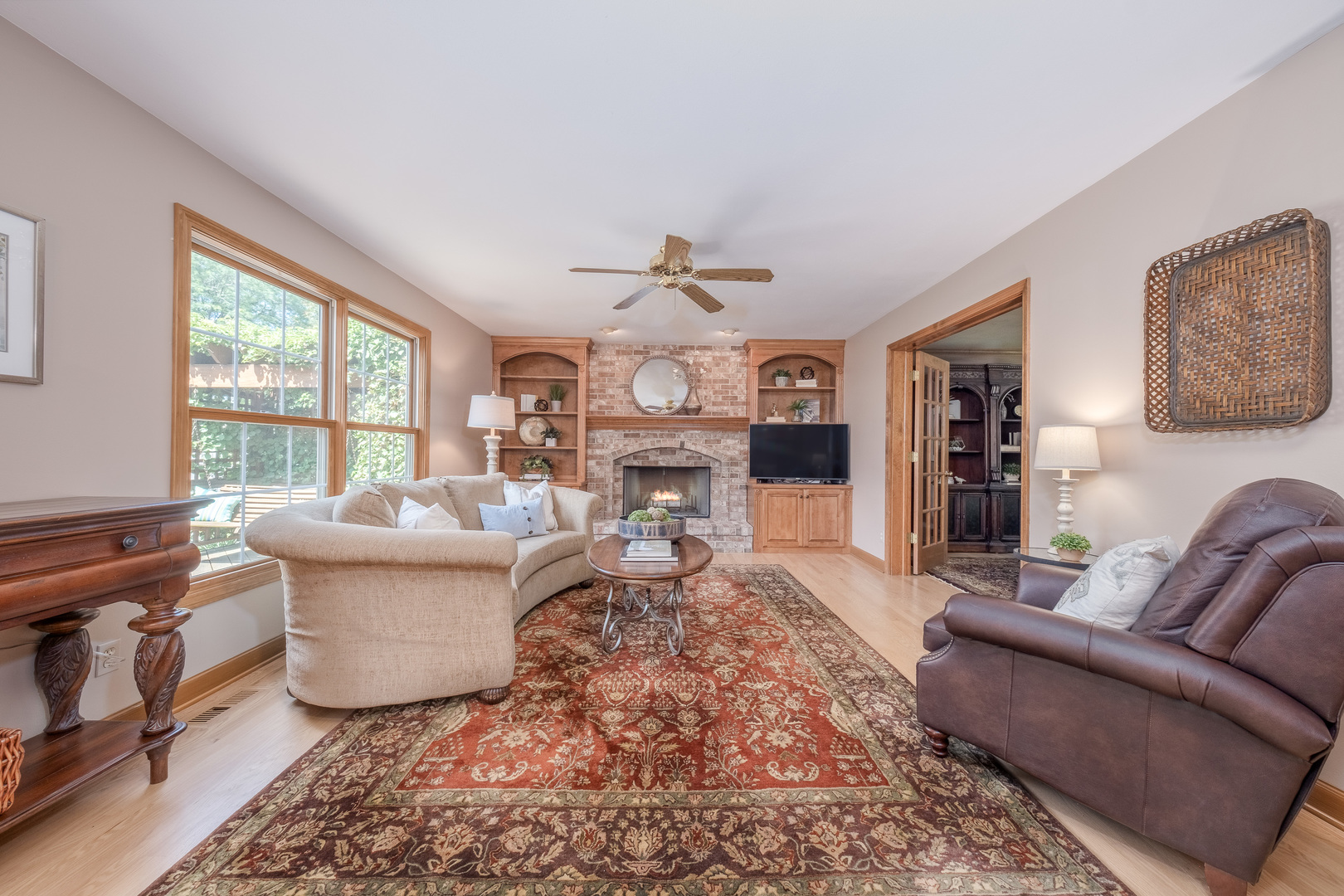 2410 Highland Road Geneva, IL 60134 - Photo 5 of 26 a living room with furniture and a large window