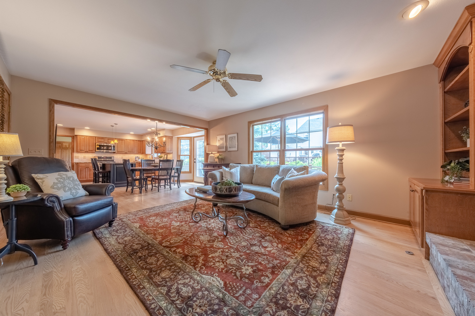 2410 Highland Road Geneva, IL 60134 - Photo 6 of 26 a living room with furniture and a large window