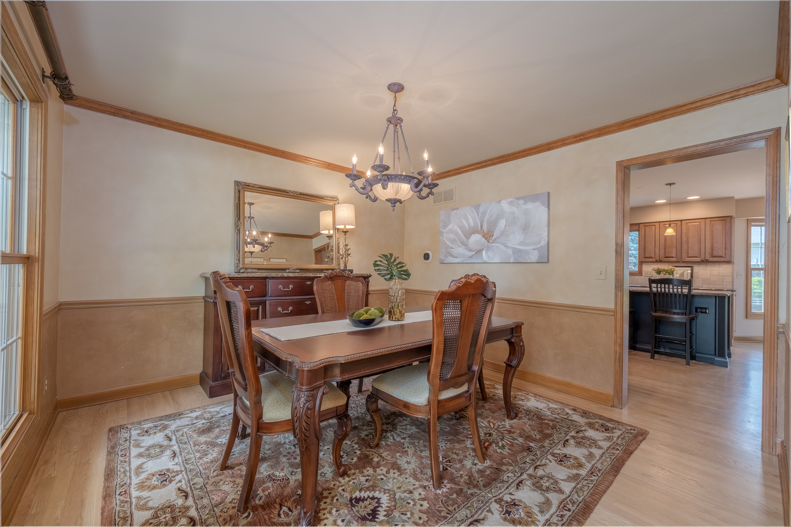 2410 Highland Road Geneva, IL 60134 - Photo 10 of 26 a view of a dining room with furniture and wooden floor
