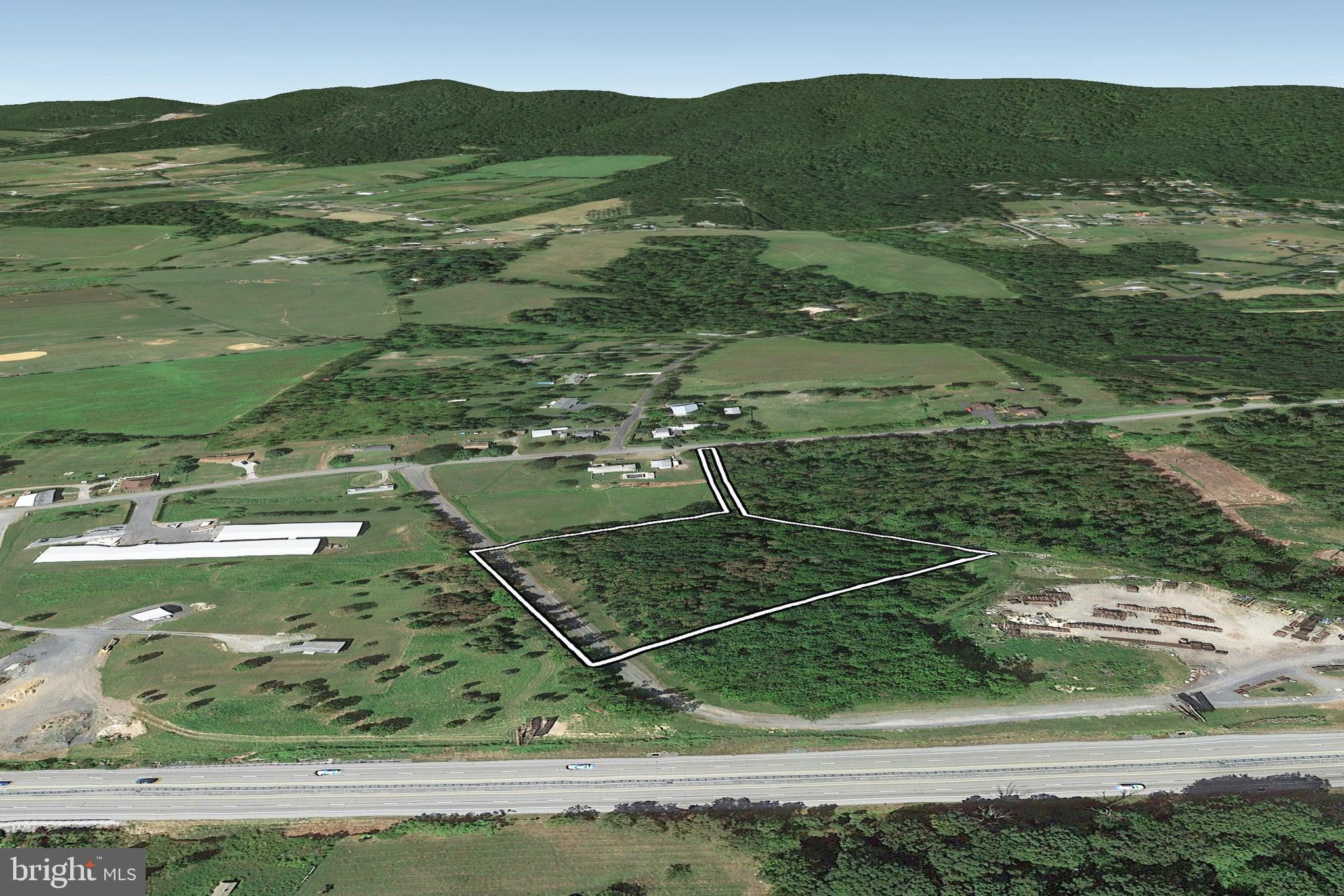 771 Range End Road Dillsburg, PA 17019 - Photo 6 of 11 a view of a lake with a mountain