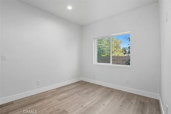 a bathroom with a sink toilet and a mirror