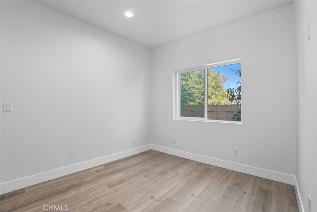 19258 Strathern Street Reseda, CA 91335 - Photo 11 of 36 an empty room with a window