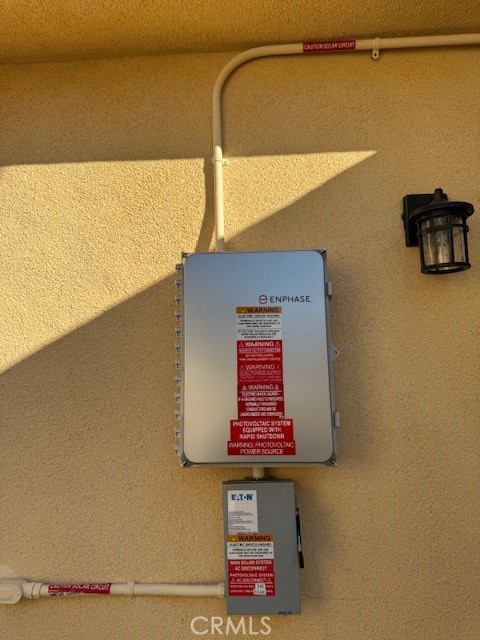 19258 Strathern Street Reseda, CA 91335 - Photo 32 of 36 a sign board on a wall next to a wall