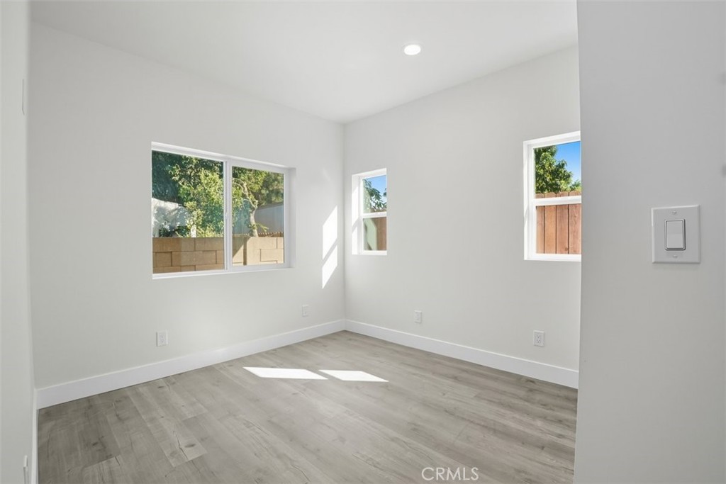 19258 Strathern Street Reseda, CA 91335 - Photo 10 of 36 an empty room with a window