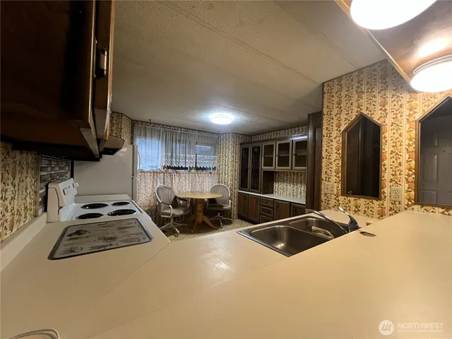 a room with gym equipment and a large window