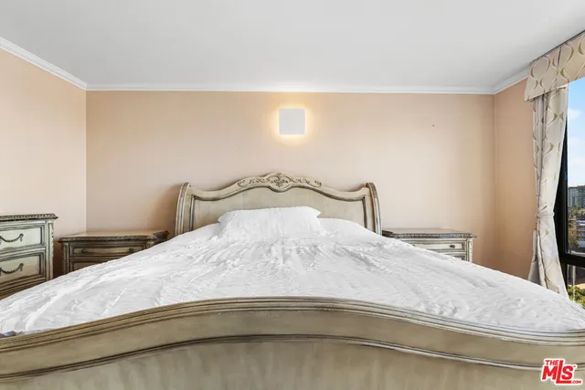 a view of a balcony with a table and chairs