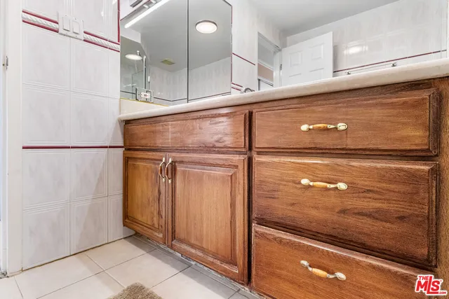 a view of a swimming pool with outdoor seating