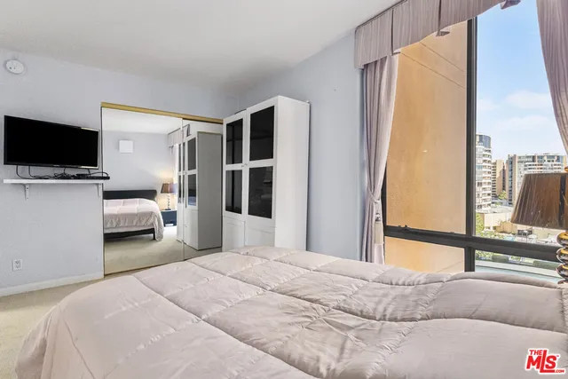 a room with lots of chairs and mirrors