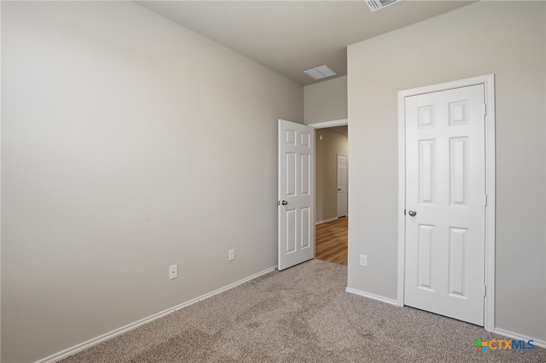 1126 Stone Vly Road, Unit B Temple, TX 76502 - Photo 14 of 26 a view of an empty room with closet area