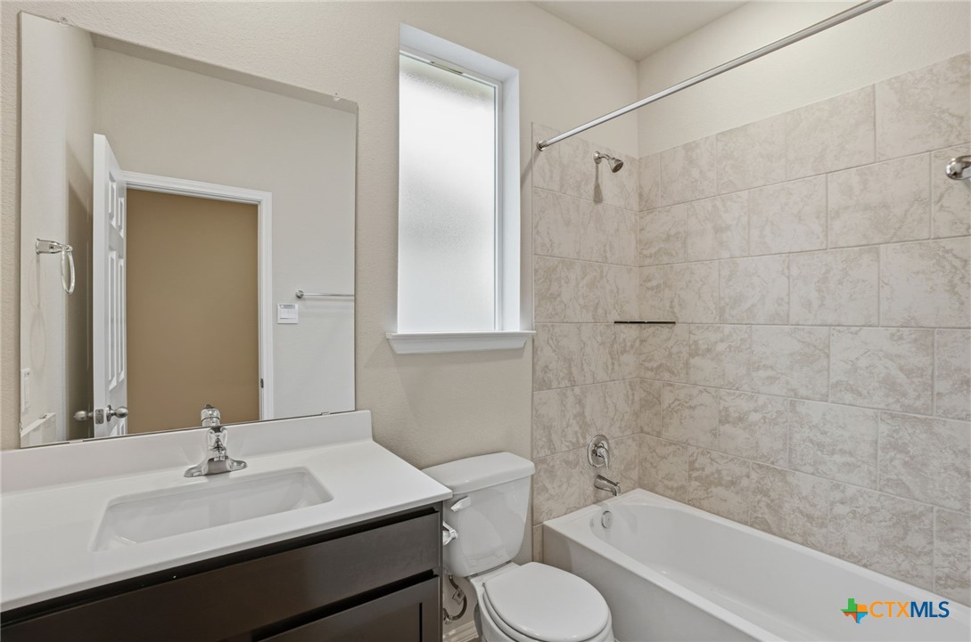 1126 Stone Vly Road, Unit B Temple, TX 76502 - Photo 15 of 26 a bathroom with a sink toilet tub and shower