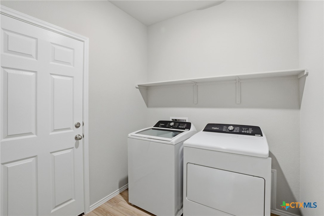 1126 Stone Vly Road, Unit B Temple, TX 76502 - Photo 17 of 26 a view of washer and dryer