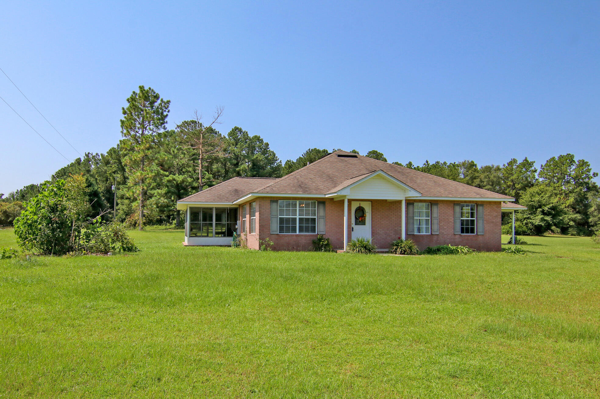 924 Hwy C4a Baker Baker, FL 32531 - Photo 3 of 47 a view of a house with a big yard