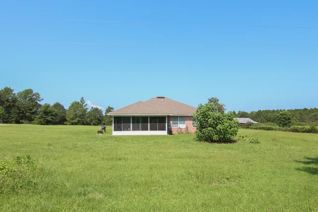 a house view with a garden space