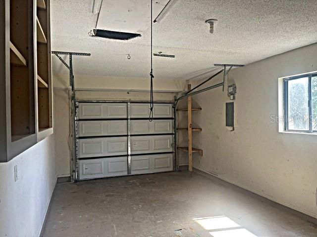 12 Pine Course Way Ocala, FL 34472 - Photo 25 of 29 a view of a room with racks on the wall