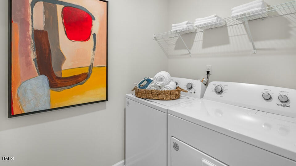 1244 Pavo Path Wendell, NC 27591 - Photo 12 of 33 a bathroom with a sink and a mirror