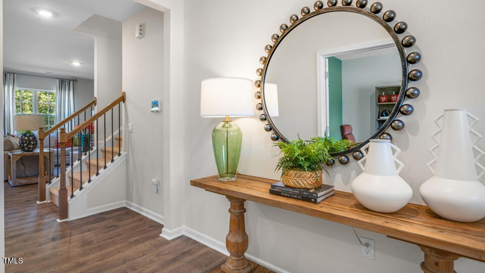 1244 Pavo Path Wendell, NC 27591 - Photo 2 of 33 a living room with furniture and potted plant