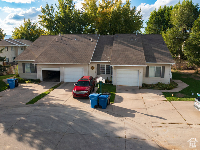 190 West 700 North Logan, UT 84321 - Photo 10 of 51 View of front facade with concrete driveway and roof with shingles