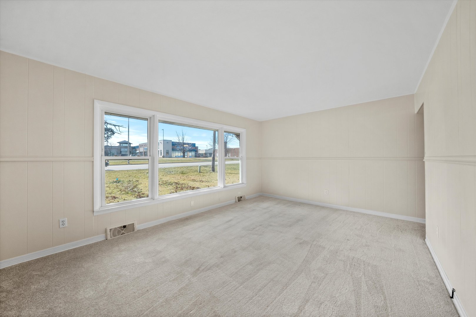 5628 West Monee Manhattan Road Monee, IL 60449 - Photo 3 of 37 a view of an empty room with a window