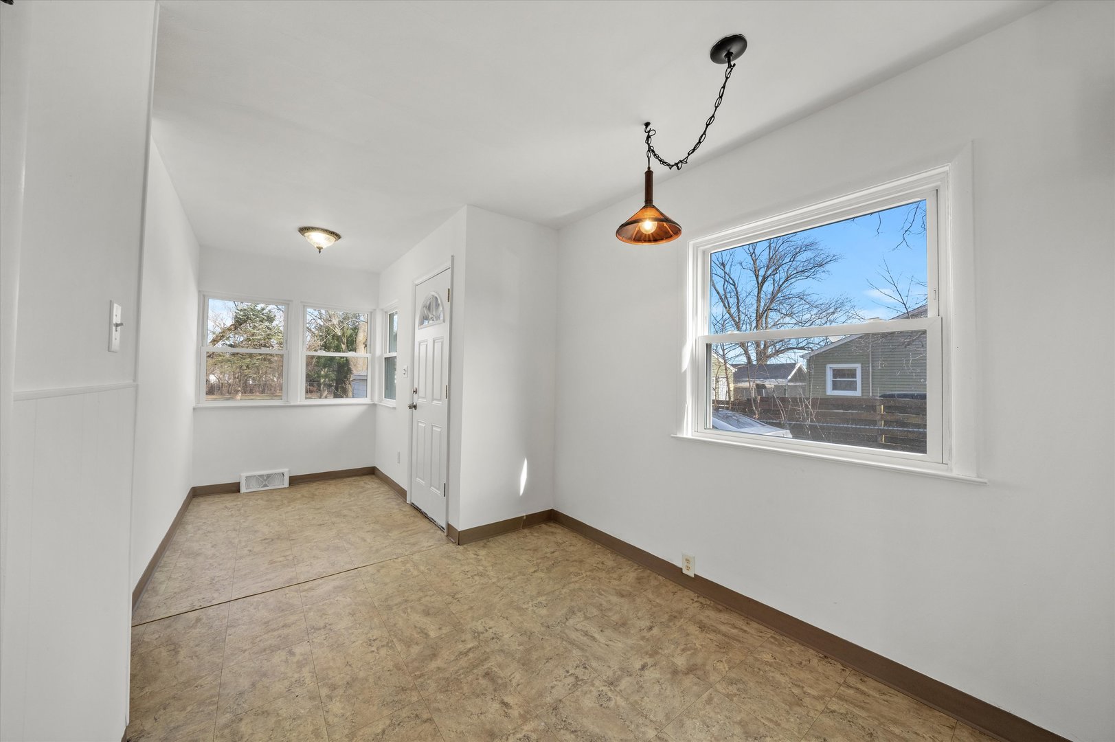 5628 West Monee Manhattan Road Monee, IL 60449 - Photo 7 of 37 a view of an empty room with a window