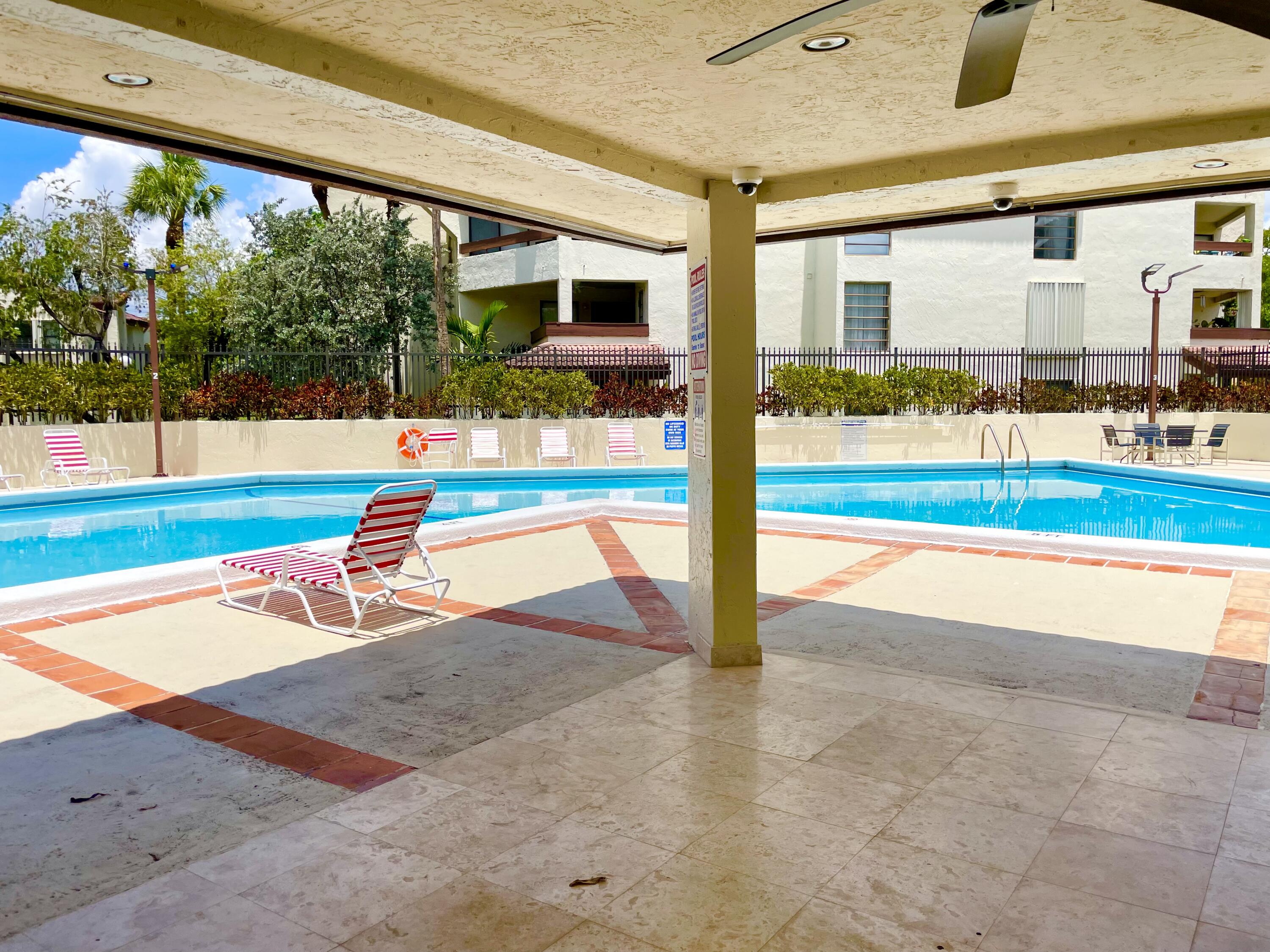 9060 Southwest 125th Avenue, Unit C204 Miami, FL 33186 - Photo 23 of 24 pool area