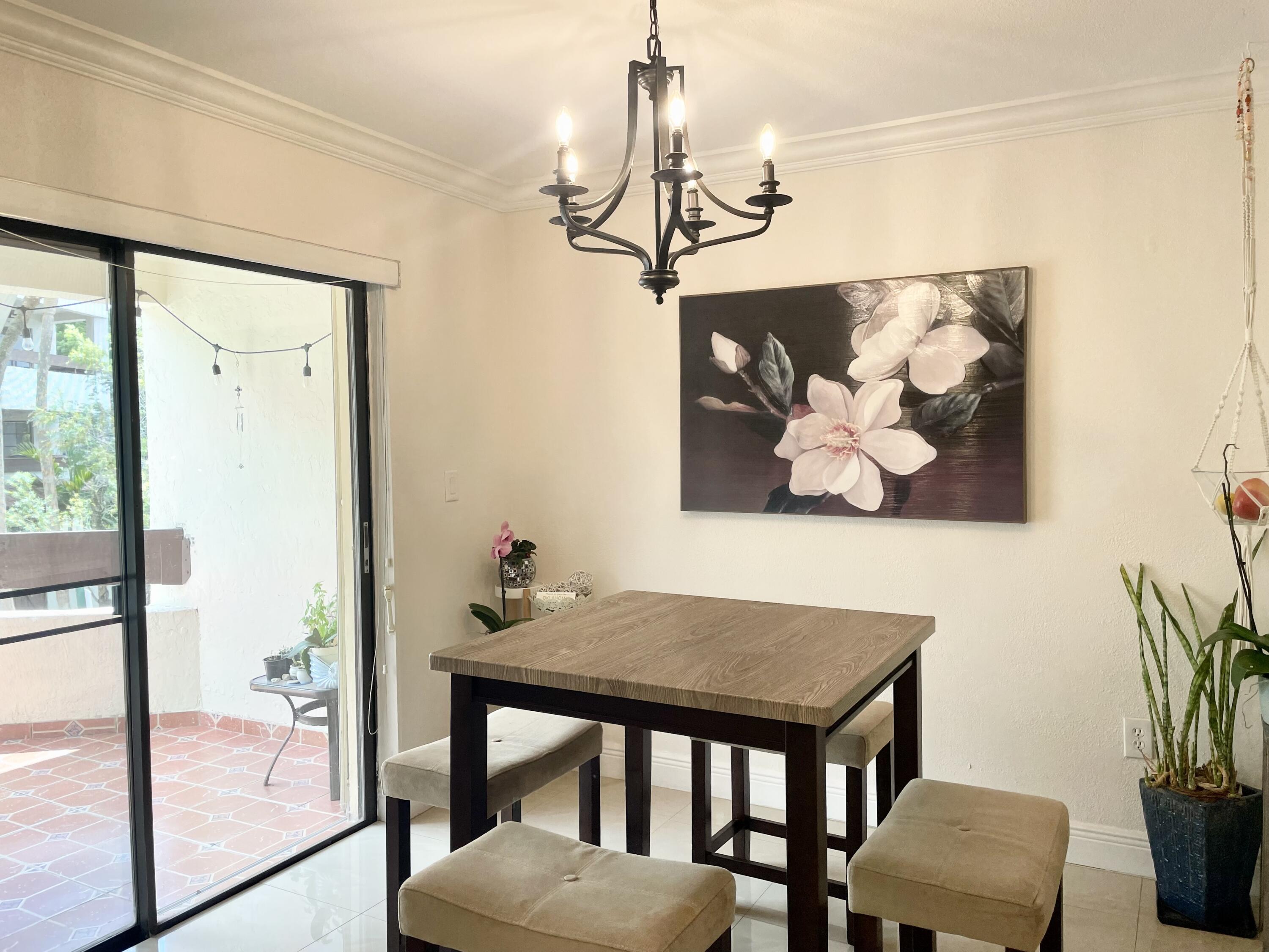 9060 Southwest 125th Avenue, Unit C204 Miami, FL 33186 - Photo 5 of 24 dining area