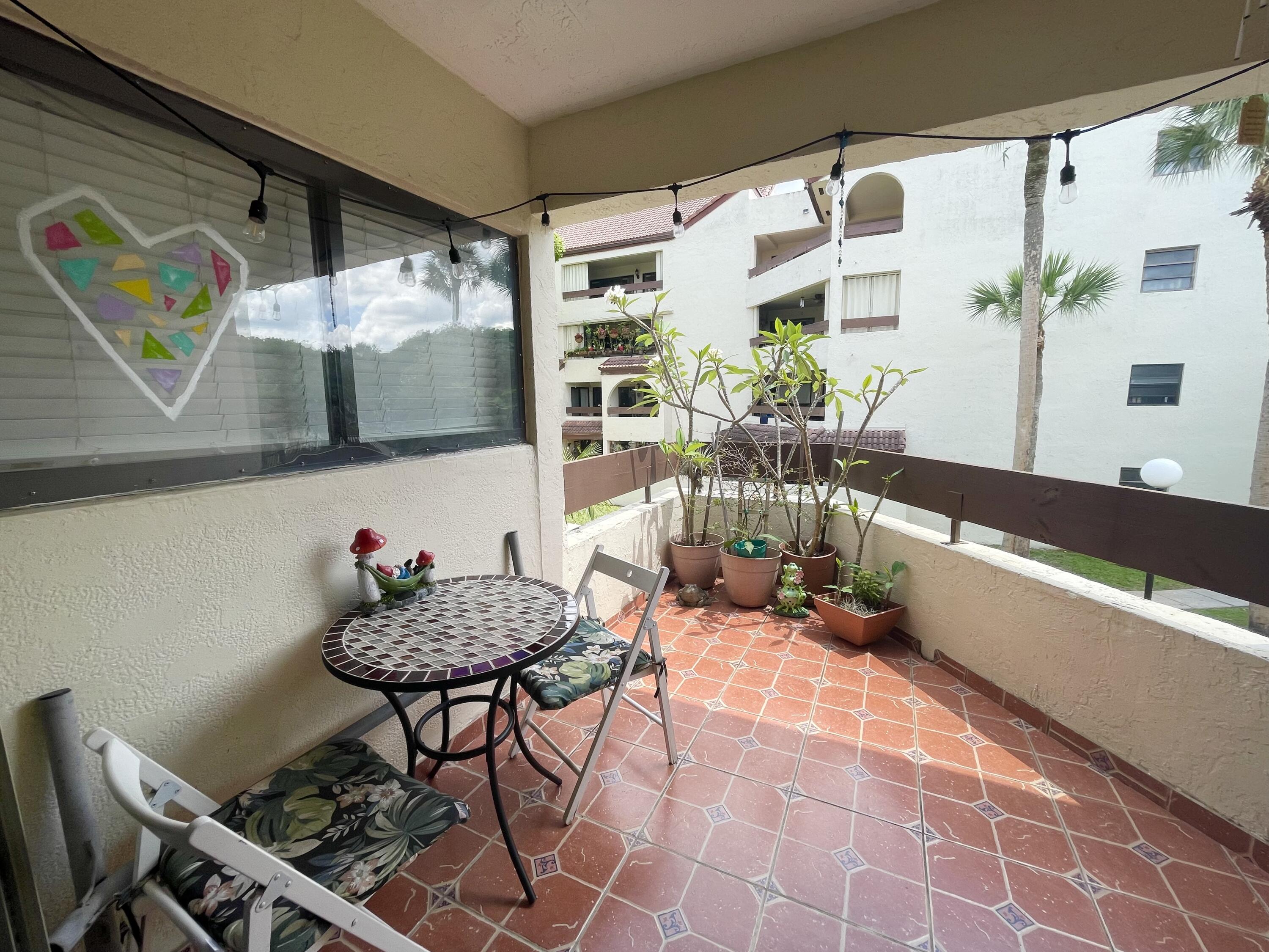9060 Southwest 125th Avenue, Unit C204 Miami, FL 33186 - Photo 6 of 24 balcony
