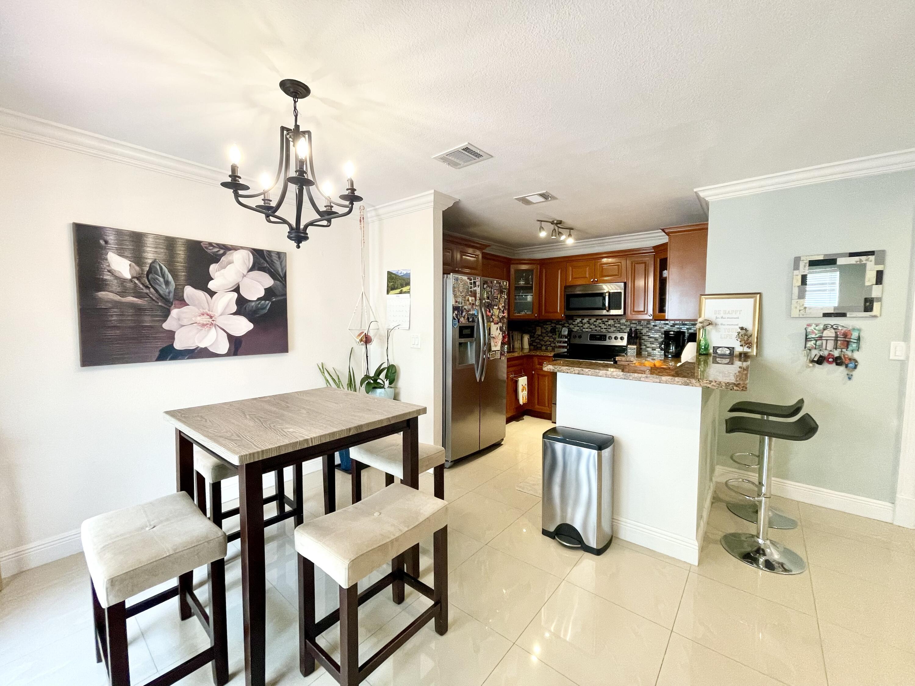 9060 Southwest 125th Avenue, Unit C204 Miami, FL 33186 - Photo 8 of 24 dining area