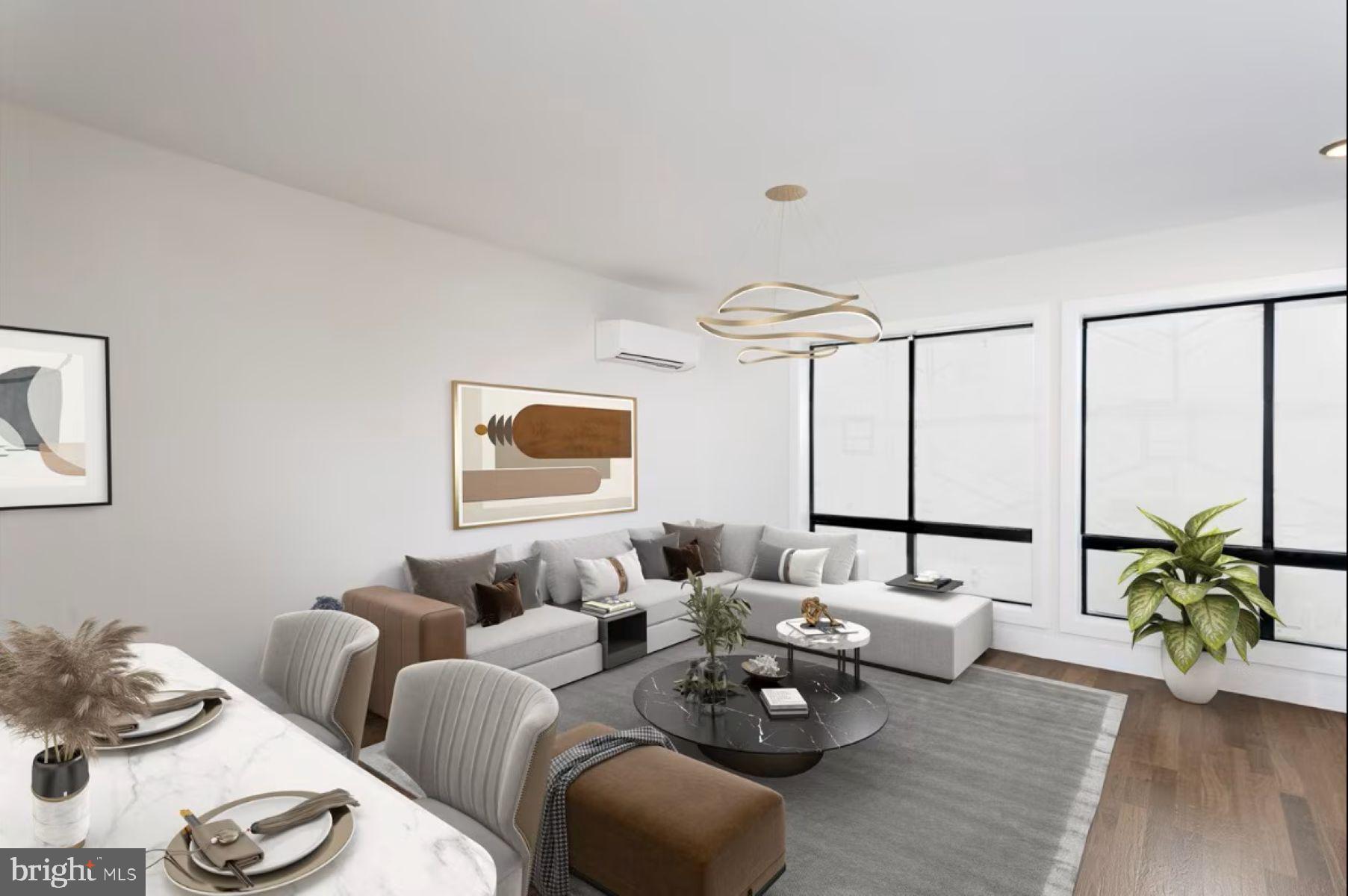 301 West Franklin Street, Unit 101 Baltimore, MD 21201 - Photo 3 of 11 a living room with furniture and wooden floor