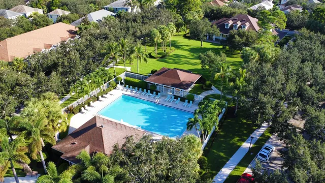 an aerial view of house with yard