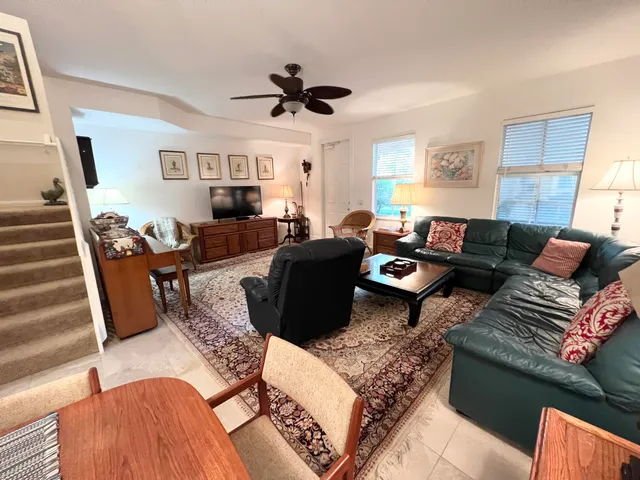 a living room with furniture or couch and a window