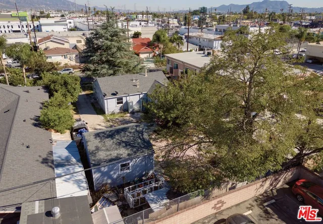 an aerial view of residential house with outdoor space