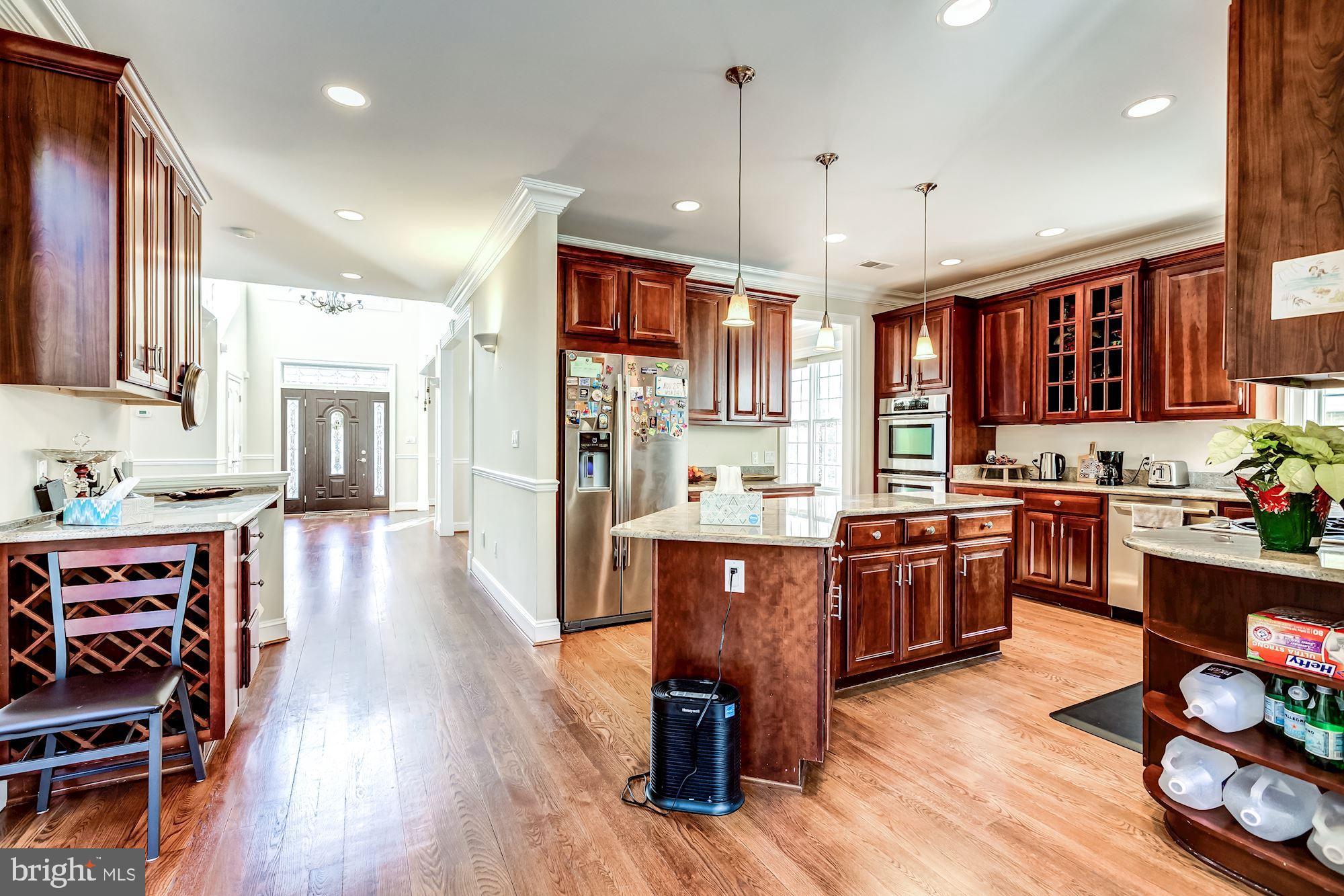 6658 Tennyson Drive McLean, VA 22101 - Photo 13 of 48 Open Kitchen looks out to back yard