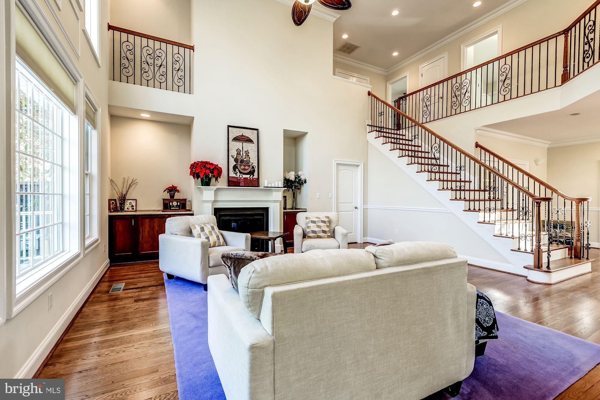 6658 Tennyson Drive McLean, VA 22101 - Photo 9 of 48 LR has two story ceilings and gas fireplace