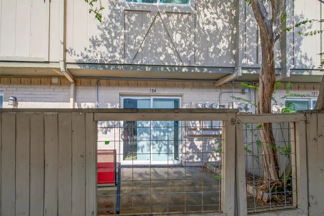a living room with a couch and large window